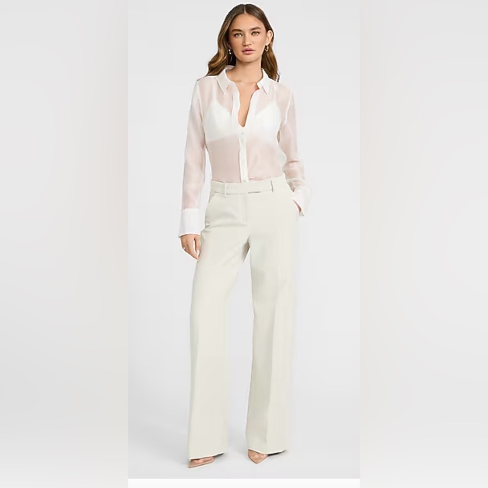 Elegant Cream Women's mid rise trousers with flare leg.